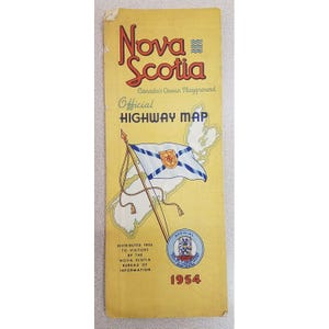 May include: A vintage Nova Scotia highway map from 1954, featuring a yellow background with red and blue text. The map includes a flag with a blue saltire and a coat of arms. The text reads "Canada's Ocean Playground."