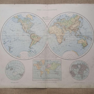 May include: A vintage paper map titled Terre des deux Hemispheres featuring two large circular projections of the world, with smaller circular maps below and a central rectangular map. The continents are colored in muted earth tones against blue oceans.
