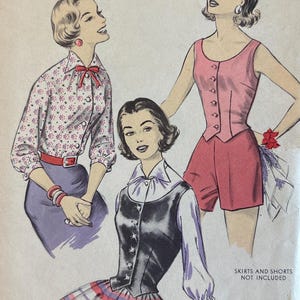 May include: Advance 8253 sewing pattern envelope for size 14, featuring illustrations of three outfits: a floral blouse with a purple skirt, a pink sleeveless vest with matching shorts, and a black vest over a white shirt with a striped skirt.