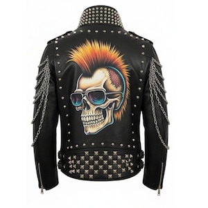 May include: Black leather jacket featuring a skull graphic with sunglasses and a mohawk on the back. The jacket has silver studs, chain accents, and a studded collar. Zippers are visible on the sleeves.