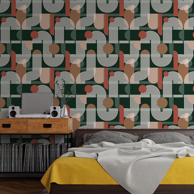 May include: Wallpaper featuring a repeating geometric pattern of white arched lines, solid dark green rectangles, and terracotta-colored circles and semi-circles. The design creates a structured, layered look with a consistent color palette.