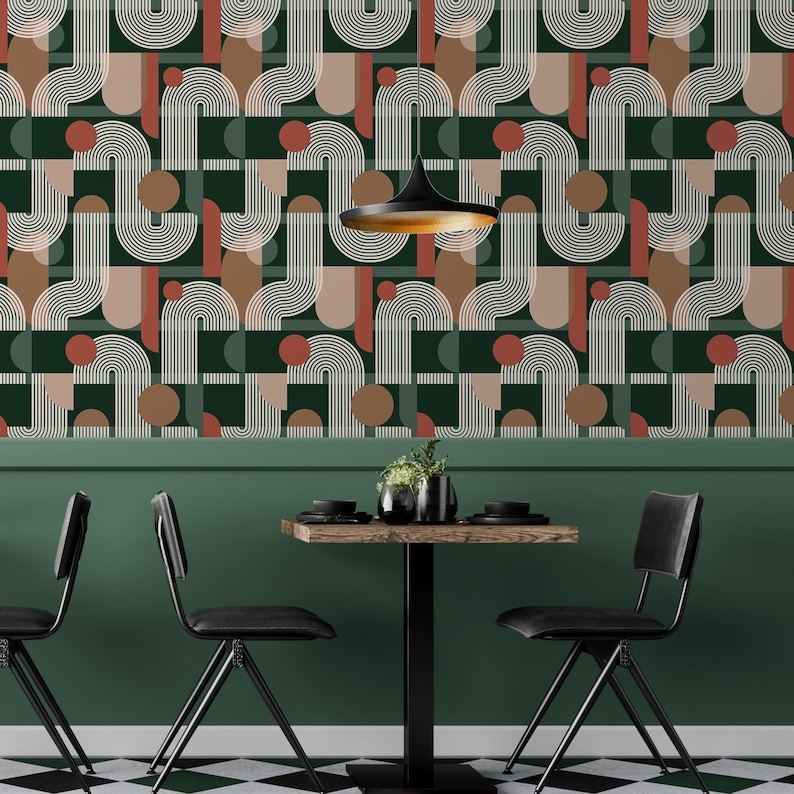 May include: Wallpaper featuring a geometric pattern of white arched lines, solid dark green rectangles, and terracotta circles. The design includes repeating curved shapes and vertical stripes on a dark green background, creating a structured visual rhythm.