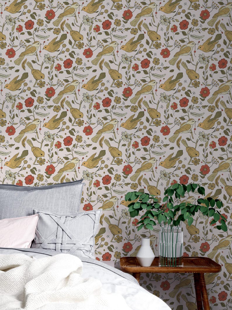 May include: Wallpaper featuring a repeating pattern of mustard yellow birds, red flowers, and green foliage on a light background. The design includes small berries and delicate stems, creating a dense, nature-inspired botanical illustration.