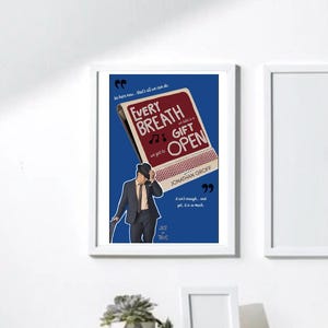 May include: Framed art print featuring the text "Every Breath Gift Open" with a matchbook design and a man in a suit. The artwork is set against a blue background with quotes and the name "Jonathan Groff".