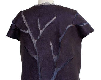 May include: A dark purple sleeveless top with a tree-like design cut out of the fabric. The top has a raw edge and a slightly flared hem.