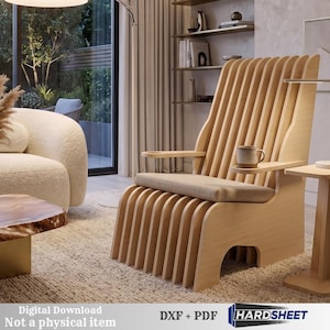 May include: A light-colored wooden chair constructed from vertical slats with a flat seat cushion and integrated armrests. The image includes the text Digital Download Not a physical item DXF + PDF HARDSHEET at the bottom of the frame.