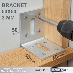May include: A silver metal bracket, 50 mm x 50 mm and 3 mm thick, being installed with a drill. The bracket is attached to a wooden surface. Text on the image reads "BRACKET 50X50 3 MM".