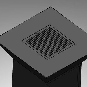 May include: A dark gray, geometric, architectural structure with a square top and a rectangular recessed vent. The vent has parallel lines. The structure appears to be a modern design, possibly for outdoor use.