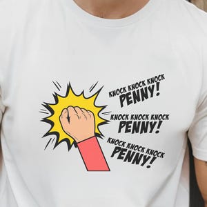 May include: White t-shirt featuring a comic-style illustration of a fist knocking on a door, surrounded by a yellow burst. The text "KNOCK KNOCK KNOCK PENNY!" is repeated three times in black, with the word "PENNY!" in bold.