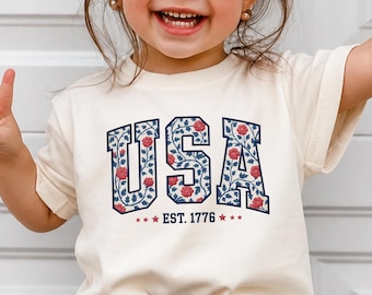 Camiseta infantil con estampado floral de EE. UU., camiseta patriótica roja, blanca y azul.