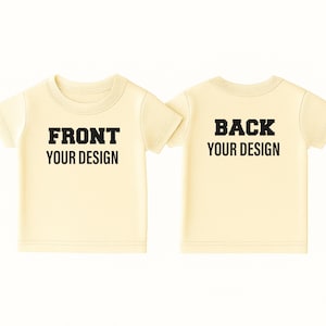 May include: Two cream-colored t-shirts, one displaying "FRONT YOUR DESIGN" in black block letters and the other displaying "BACK YOUR DESIGN". The shirts are short-sleeved and have a crew neck.