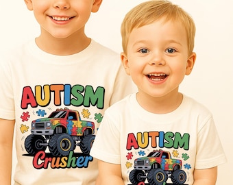 May include: Two children wearing cream-colored t-shirts with the word "AUTISM" in rainbow colors. The shirts feature a colorful monster truck design with puzzle pieces and the word "Crusher".
