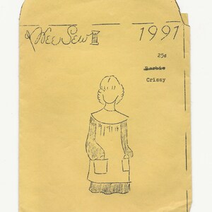 May include: A yellow envelope with a hand-drawn illustration of a girl wearing a dress with pockets. The envelope has the text "Wee Sew" and "1997" written on it. The text "25¢", "Barbie", and "Crissy" are also written on the envelope.
