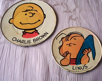 Vintage 1950 child’s metal plates.  Peanuts characters.  B938-2.5.