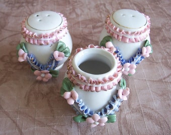 Vintage porcelain salt, pepper, and toothpick holder set.  B563-.75.