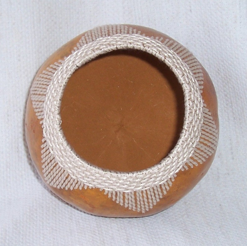 Small gourd bowl with stitched and woven V pattern at rim. Etsy