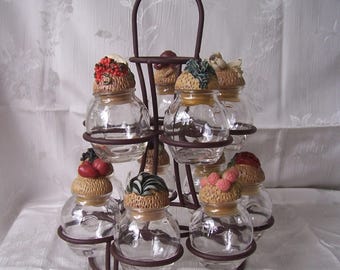 Vintage Shonfeld’s spice set in rack.  B374-.80.