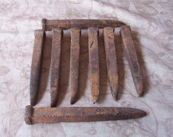 Vintage group of 8 heavy steel harrow tine spikes. Set AAA. T701.