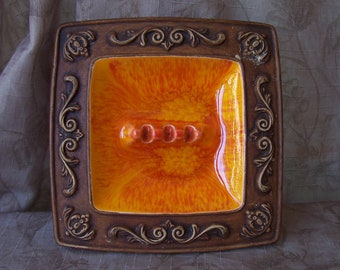 Vintage fancy orange glazed mid-century modern Treasure Craft ashtray.  B627-1.