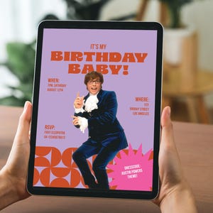 May include: A tablet screen shows a birthday party invitation with the words "IT'S MY BIRTHDAY BABY!". The invitation features a cartoon image of a man in a blue velvet suit. The invitation includes the date, time, location, RSVP, and dress code.
