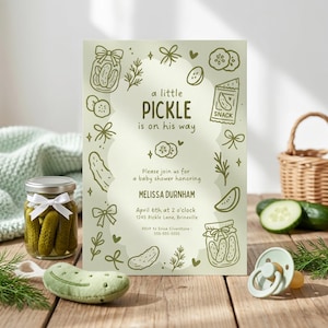 May include: A light green baby shower invitation card featuring dark green line art of pickles, jars, and bows. The text reads: a little PICKLE is on his way, Please join us for a baby shower honoring MELISSA DURNHAM, April 6th at 2 o'clock.