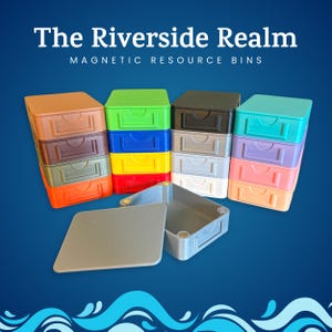 May include: Stacks of colorful magnetic resource bins in various colors, including orange, brown, green, blue, yellow, red, black, gray, white, purple, pink, and teal. The bins have a drawer-like design and are labeled "The Riverside Realm MAGNETIC RESOURCE BINS".
