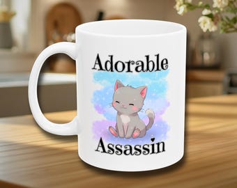 Adorable Assassin Cat Mug, Dark Humor Coffee Cup, Ironic Cat Lover Gift