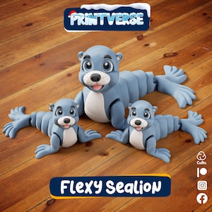 May include: Three blue Flexy Sealion figurines with white bellies and expressive faces are displayed on a wooden surface. The figurines have articulated bodies and flipper-like appendages. The Printverse logo is visible at the top.