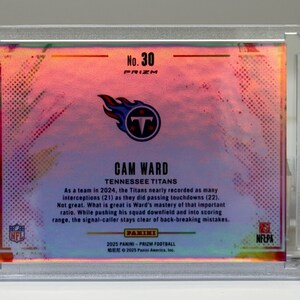 May include: A Cam Ward Tennessee Titans football card, encased in a clear protective holder. The card features the team logo and player information, with the text "No. 30 PRIZM". The background has a colorful, iridescent design.