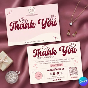 May include: Two pink "Thank You" cards with burgundy text and heart designs. One card includes "FOR YOUR ORDER" and a promo code. The image also shows a necklace, earrings, a gift box, and a container of pearls.
