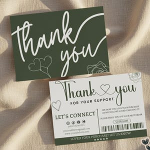 May include: Two thank you cards. One is dark green with white script reading "Thank you" and heart and rose illustrations. The other is white with dark green accents, "Thank you" text, and a barcode. Includes social media handles.