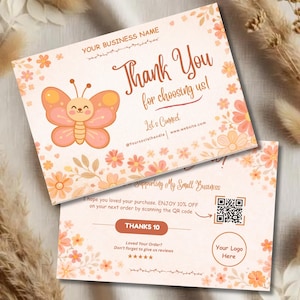 May include: Two peach-colored thank you cards with floral and butterfly illustrations. The cards read "Thank You for choosing us!" and include a QR code and space for a logo. The cards are designed for small business use.