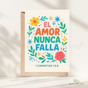 May include: Greeting card with the text "EL AMOR NUNCA FALLA" in orange, green, and blue, surrounded by colorful floral and leaf illustrations. The text "1 CORINTIOS 13:8" is at the bottom. The card is in a brown envelope.