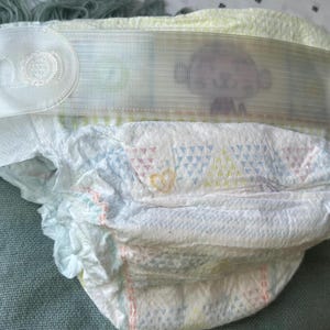 Diaper Tab Extender V3 Button connector
