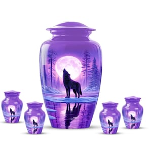 May include: A collection of purple cremation urns. The large urn features a full moon, a howling wolf, and a winter landscape scene. Smaller urns have the same design. The urns are made of a glossy material.