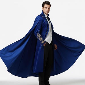 Embroidered bLUE velvet men’s tuxedo with dramatic cape