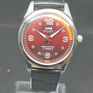 Vintage HMT Pilot Watch: Red Sunburst Dial, Para Shock, Hand-Winding