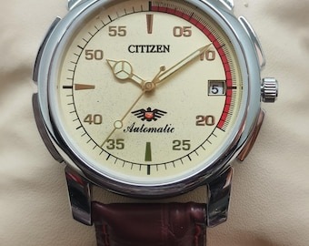 Reloj de pulsera Citizen automático para hombre, esfera color crema, día/fecha, acero inoxidable - 8200