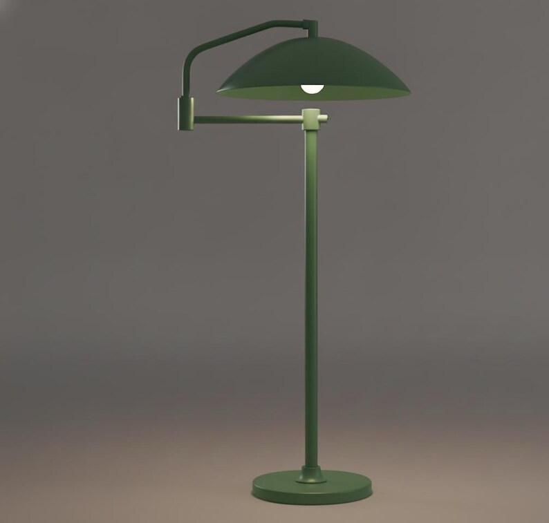 May include: A green floor lamp with a circular base and a curved arm holding a dome-shaped shade. The lamp has a minimalist design and a single light bulb. The color is a muted, olive green.