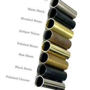 May include: A collection of metal tubes in various finishes, including brushed chrome, matte black, brushed brass, antique patina, polished brass, raw brass, black brass, and polished chrome. The names of the finishes are listed in white text.
