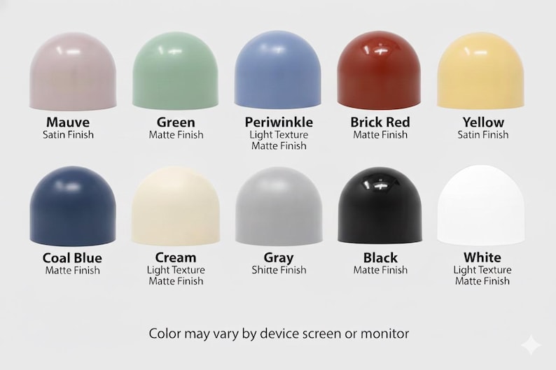 May include: Ten coloured, dome-shaped objects are displayed, including mauve, green, periwinkle, brick red, and yellow. Each dome has a different finish, such as satin or matte. Text on the image indicates the colour names and finishes.