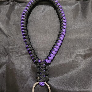 paracord keychain. purple and black paracord keychain