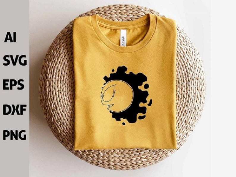 May include: Mustard yellow t-shirt with a black and white graphic design. The design features a stylized face within a black blotch. The shirt is folded and placed on a woven surface. The text "AI SVG EPS DXF PNG" is on the left.