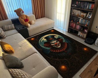 May include: A rectangular area rug featuring a sinister clown design. The clown has red hair, a white face, and a menacing grin, set against a dark background with a full moon. Ornate border with orange accents.