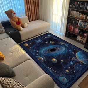 Alfombra espacial galáctica con planetas y un agujero negro: alfombra cósmica para salas de estar de ciencia ficción, salas de juegos o dormitorios con temática espacial.