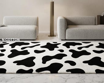 Tappeto in lana trapuntato a mano con stampa mucca – Tappeto con motivo animalier bianco e nero