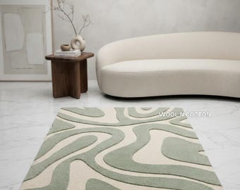 Alfombra de lana tejida a mano – Remolino abstracto verde salvia, alfombra color crema tallada en 3D