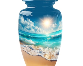 May include: A blue cremation urn with a glossy finish. The urn features a scenic beach design with a bright sun, blue sky, and ocean waves. The bottom of the urn is tan, resembling sand.