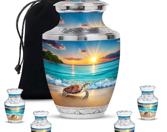 May include: A large, silver-toned urn and several smaller keepsake urns, all featuring a beach scene with a sea turtle. The urns have a sunset over the ocean design. A black velvet bag is included.