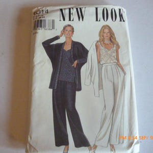 May include: A vintage sewing pattern titled "NEW LOOK" featuring illustrations of two women in stylish outfits. One model wears a dark ensemble, while the other is in a white outfit. The pattern number is 6314.